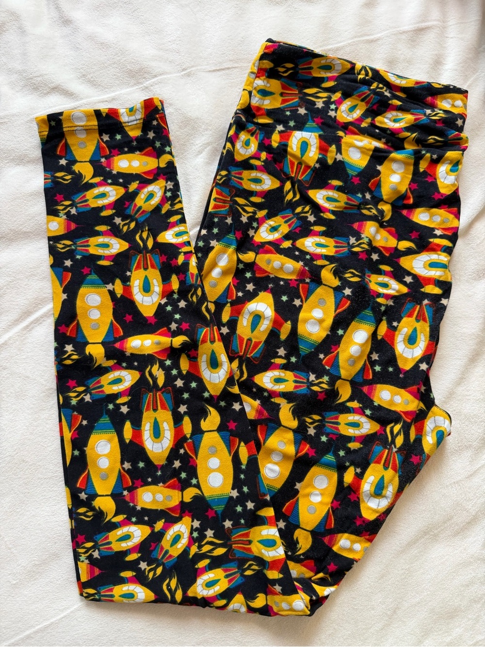 LuLaRoe Black Leggings with Yellow Rocket Print and Multicolor Accents